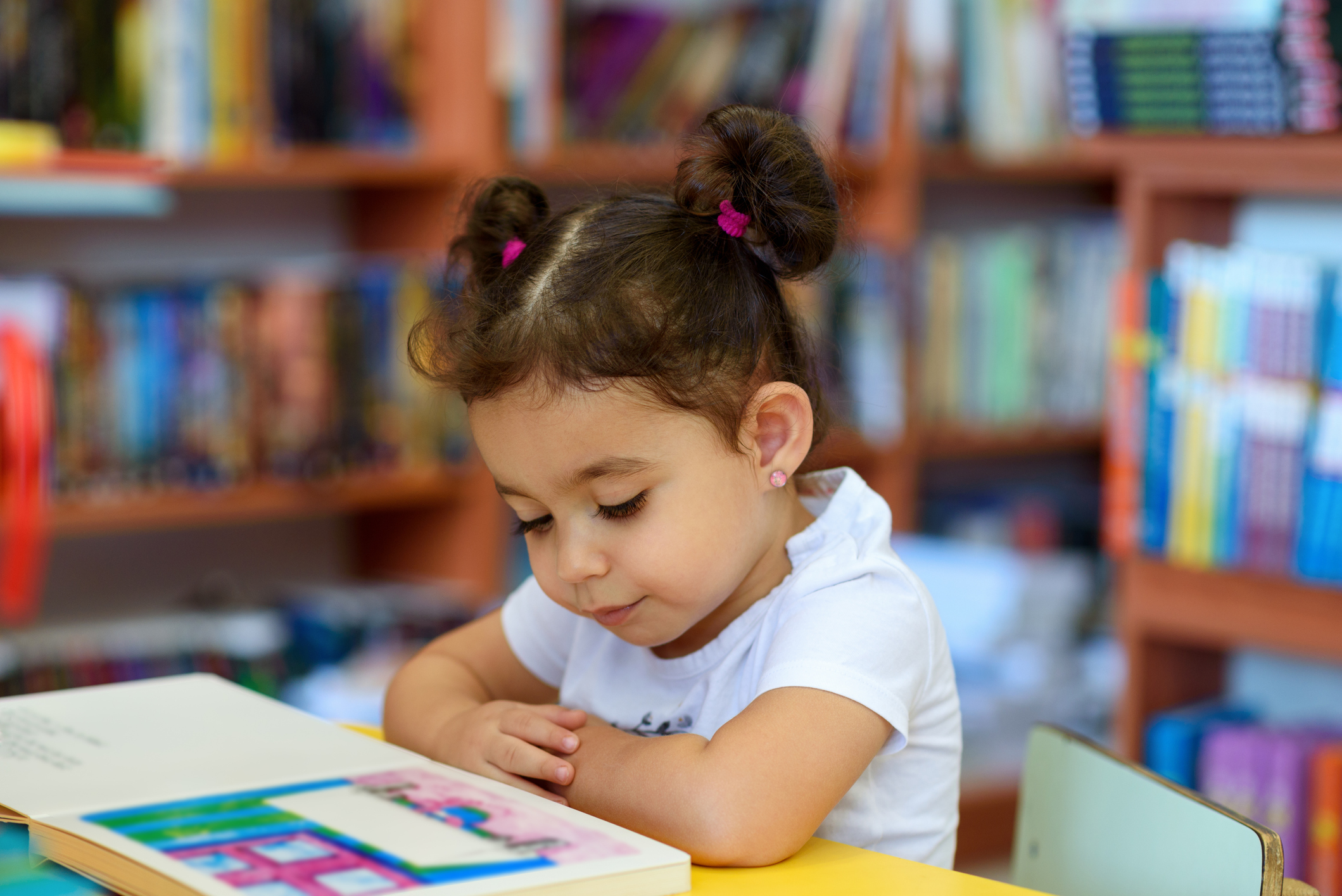little girl reading.
